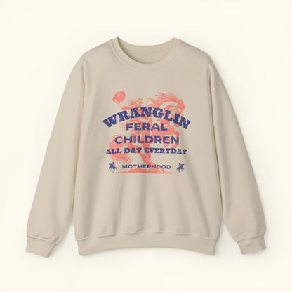 Wrangling Feral Children Sweatshirt | Cozy Gifting for Moms | Perfect for Family Gatherings | Motherhood Celebrations | Unisex Crewneck